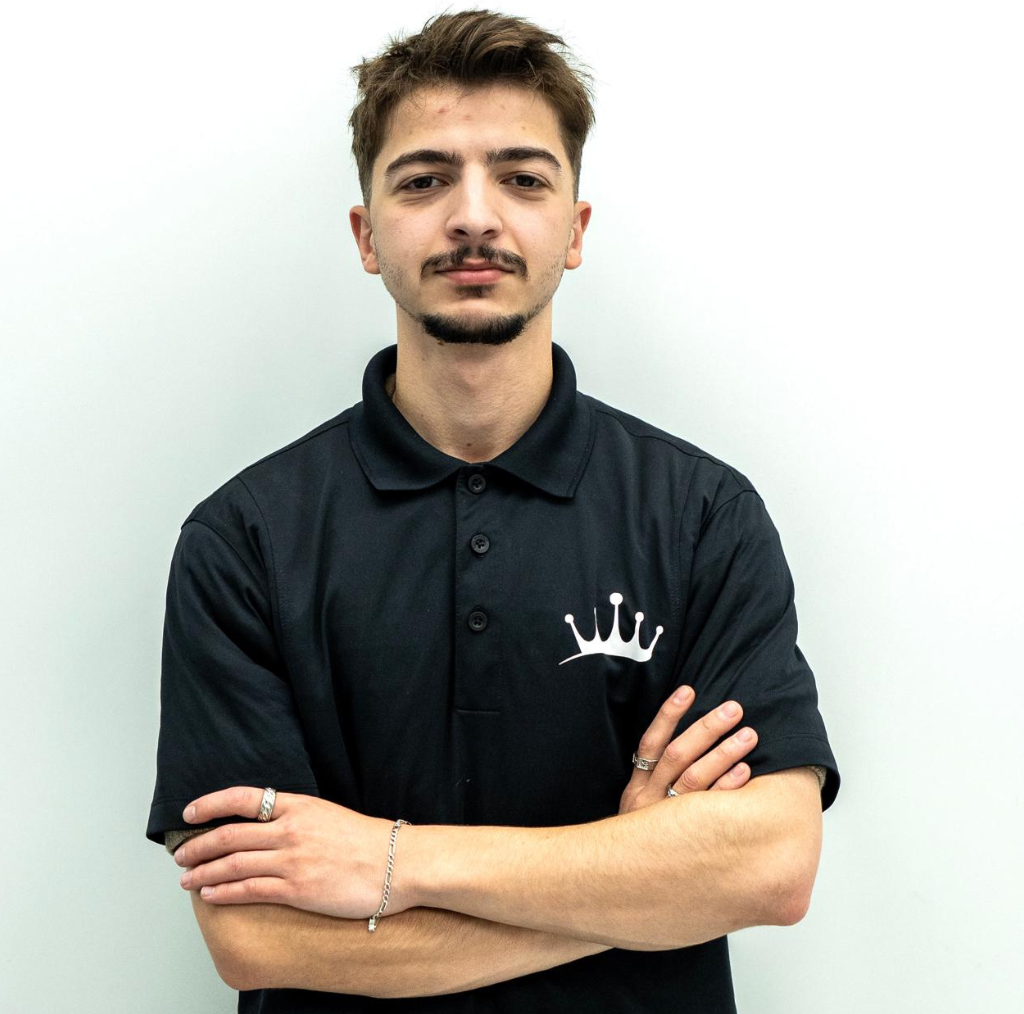 Moe E. providing expert cuts and modern styles